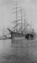 Photograph: [Two ships docked by the pier]