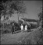 Photograph: [Boys and girls walking along a country road(1)]