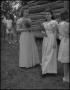 Primary view of [Bridesmaids holding bouquets]