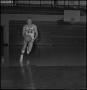 Photograph: [Bubba Bailey in mid-dribble]
