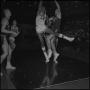 Photograph: [Basketball players jump for the ball, 7]