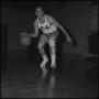 Photograph: [Les Pollock in mid-dribble]