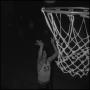 Photograph: [Wayne Hopkins tossing basketball]