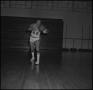 Photograph: [Bill Cutter passing a basketball]