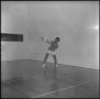 Photograph: [Woman playing racquetball]