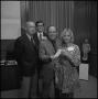 Photograph: [President Nolen receiving a check from representatives of Atlantic R…