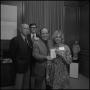 Photograph: [President Nolen receiving a check from representatives of Atlantic R…