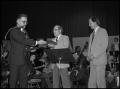 Photograph: [Breeden presenting plaques to Nolen and Myers]