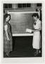 Photograph: [Dorothy Babb with chalkboard]
