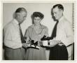 Photograph: [Fowler, Babb, and Hannah with gifts]