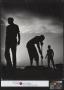Photograph: [Silhouetted Waterfront Workers]