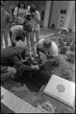 Primary view of object titled '[Lowering the time capsule]'.