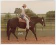 Photograph: [Unknown woman at the North Texas Stallion Station & Training Center]