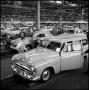 Photograph: [Automobiles in a factory]