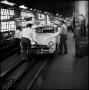 Photograph: [Automobiles in a factory, 10]