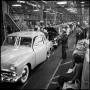 Photograph: [Automobiles in a factory, 12]