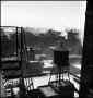 Photograph: [Water tower on top of a building, 2]