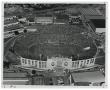 Primary view of [Aerial view of the Cotton Bowl full of spectators]