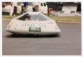 Photograph: [Centennial Solar Car being driven by a student during the GM Sunrayc…