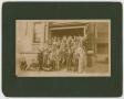 Photograph: [Students standing on the steps of the Normal Building]