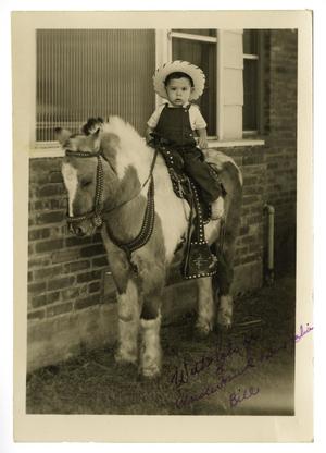 Primary view of object titled '[William J. Cuellar ridding a pony]'.