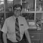 Photograph: [Faculty member in the chemistry lab]