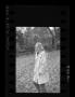 Photograph: [Dana Long standing in a park, 2]