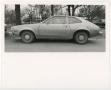 Photograph: [A 1970s Ford Pinto parked near trees]