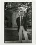 Photograph: [Larry McMurtry in Front of the Auditorium Building]