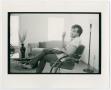 Photograph: [Photograph of a man in his home]