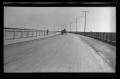 Photograph: [Wagon on a bridge]