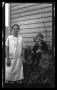 Photograph: [Irene Williams posing with her son Charles]