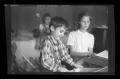Photograph: [Byrd Williams IV and other children playing in a room]