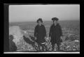 Photograph: [Byrd Williams III and John standing on top of a cliff]