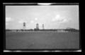 Photograph: [Water tower and a silo]