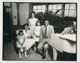 Photograph: [Portrait of a family around a piano]