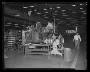 Primary view of object titled '[Bell employees working on the YH-40]'.
