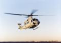 Photograph: [Photograph of a Marine helicopter flying in the air]