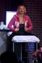 Photograph: [Kim Fields Dressed in Pink on Stage]