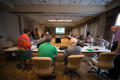 Photograph: [Individuals in Conference Room]