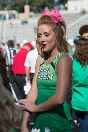 Primary view of object titled '[UNT Cheerleader in Pink Bow]'.