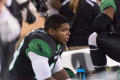 Primary view of [Mean Green Football Player Resting]