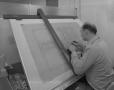 Primary view of [Man at Drafting Board]