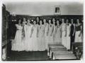 Photograph: [Group of Girls in Formal Dress at School]