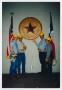Photograph: [Four City Employees with City Seal]