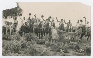 Primary view of object titled '[Cowhands on Horseback Holding Hats]'.