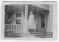 Photograph: [Unidentified Girl Standing on a Baluster]