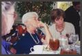 Photograph: [Three Women at Banquet]