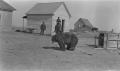 Photograph: [Two Men and a Bear]