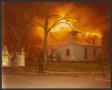 Photograph: [Two story house in flames]